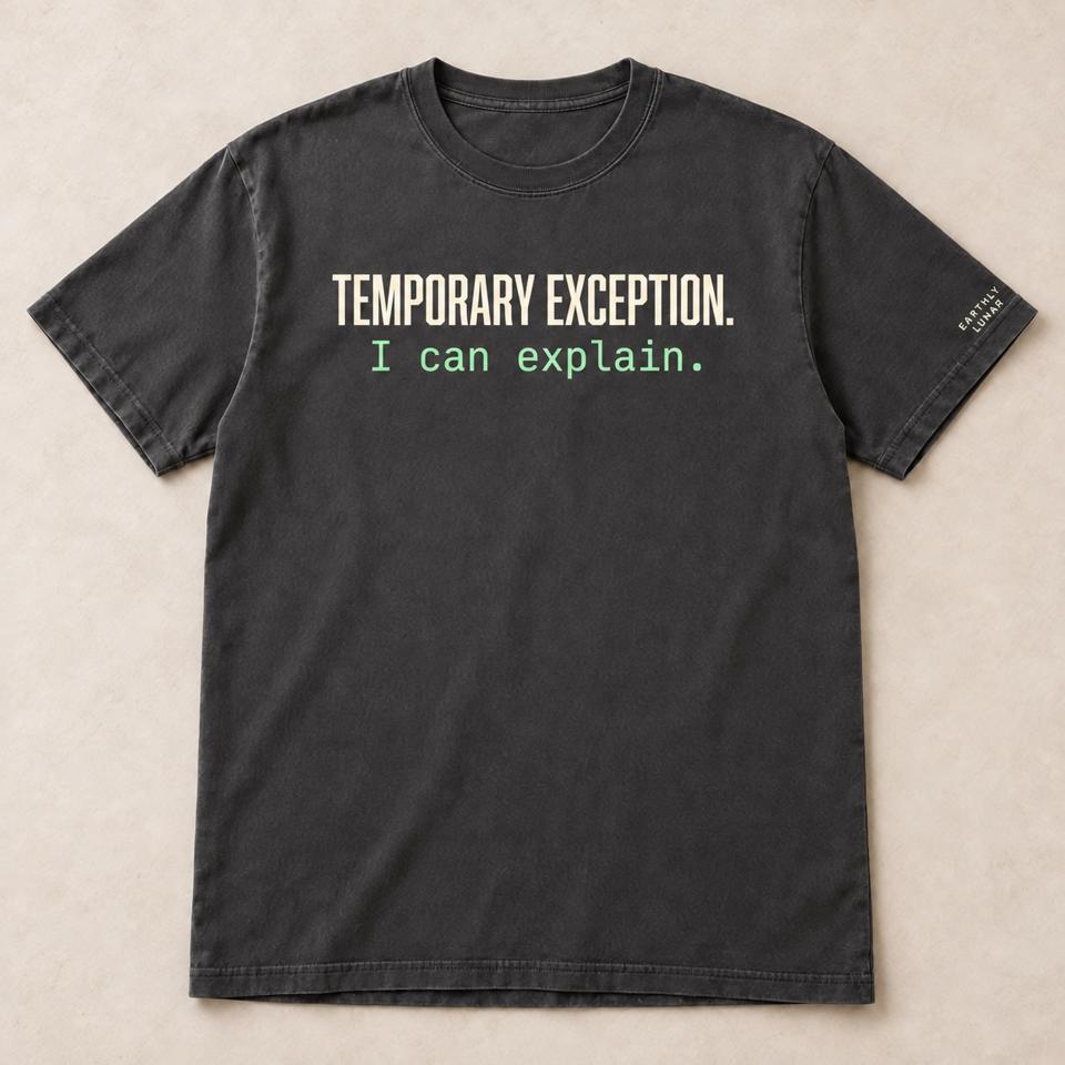 Charcoal tee with 'TEMPORARY EXCEPTION.' in condensed cream capitals over 'I can explain.' in mint typewriter type